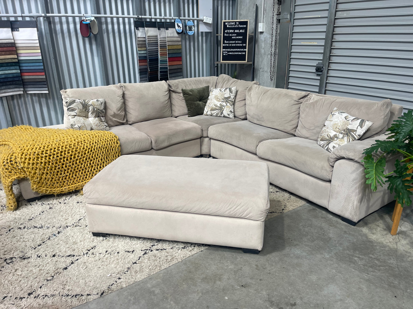 HARVEY NORMAN 5.5 SEATER CORNER SUITE WITH CHAISE + SOFA BED + STORAGE OTTOMAN